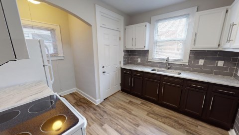 NEW LVT Floors, and updated cabinets and brand new sink!