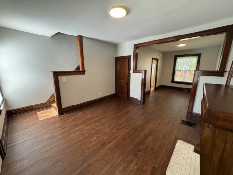 Living room w/ decorative fireplace