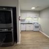 Kitchen w/ new Maytag washer/dryer