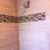 Shower is updated with porcelain tile!