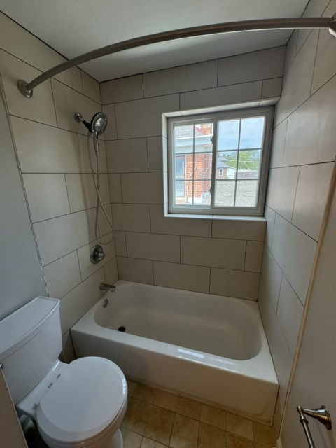 Updated tile surround w/ moen shower fixture