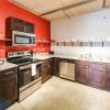 Kitchen with Granite Countertops and Stainless Steel Appliances