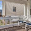 Beautiful private front porch!  Also tons of parking out back!  One spot for each person!
