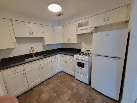 Renovated kitchen w/ granite countertops