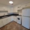 Renovated kitchen w/ granite countertops