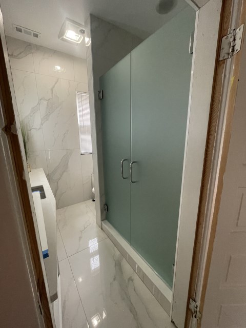 BOTH FRENCH SHOWER DOORS OPEN